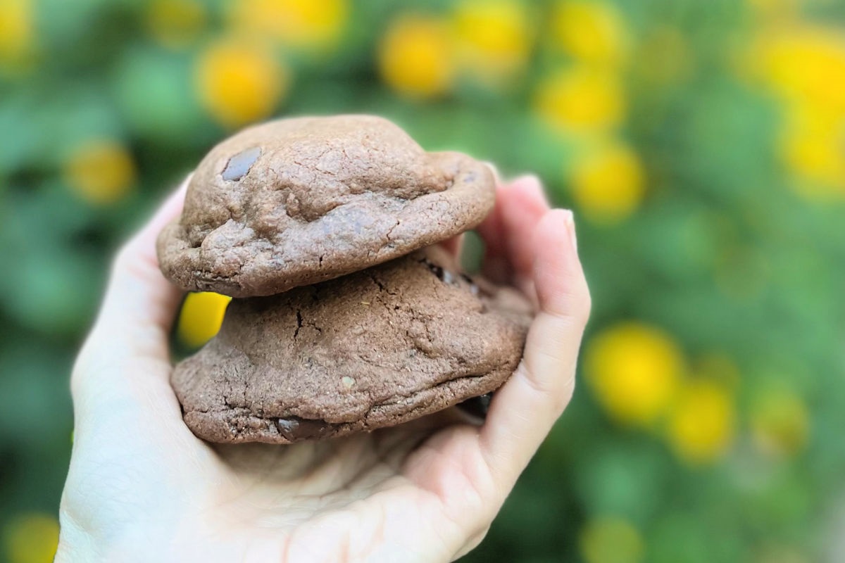A chocolate chocolate chip cookie stuffed with a peanut butter crème sandwich cookie.